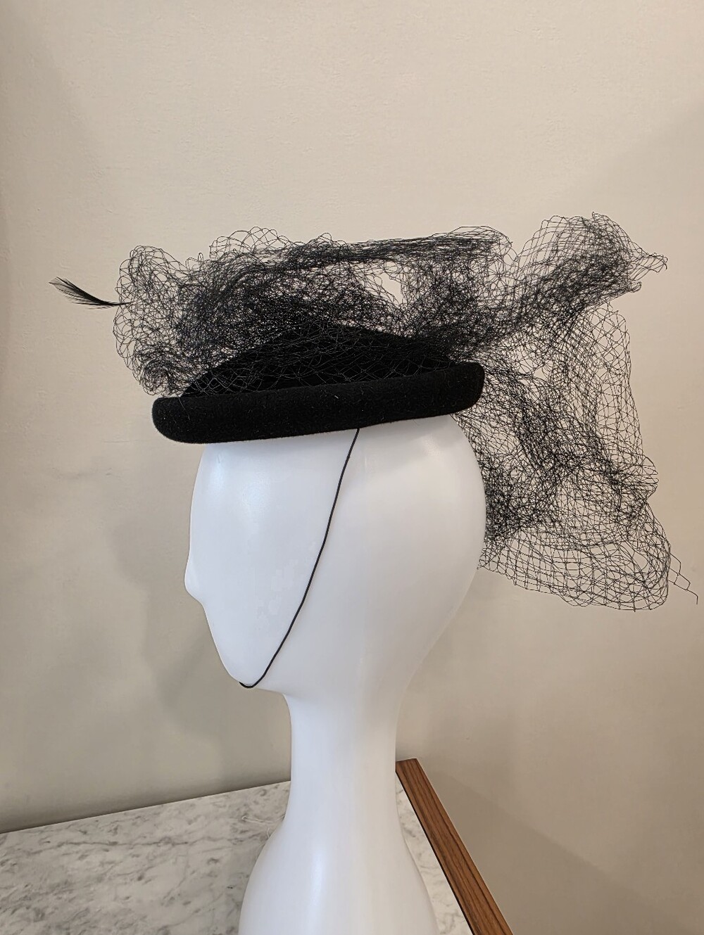Lola Hats Black Veiled Pillbox Hat with Feather Accent